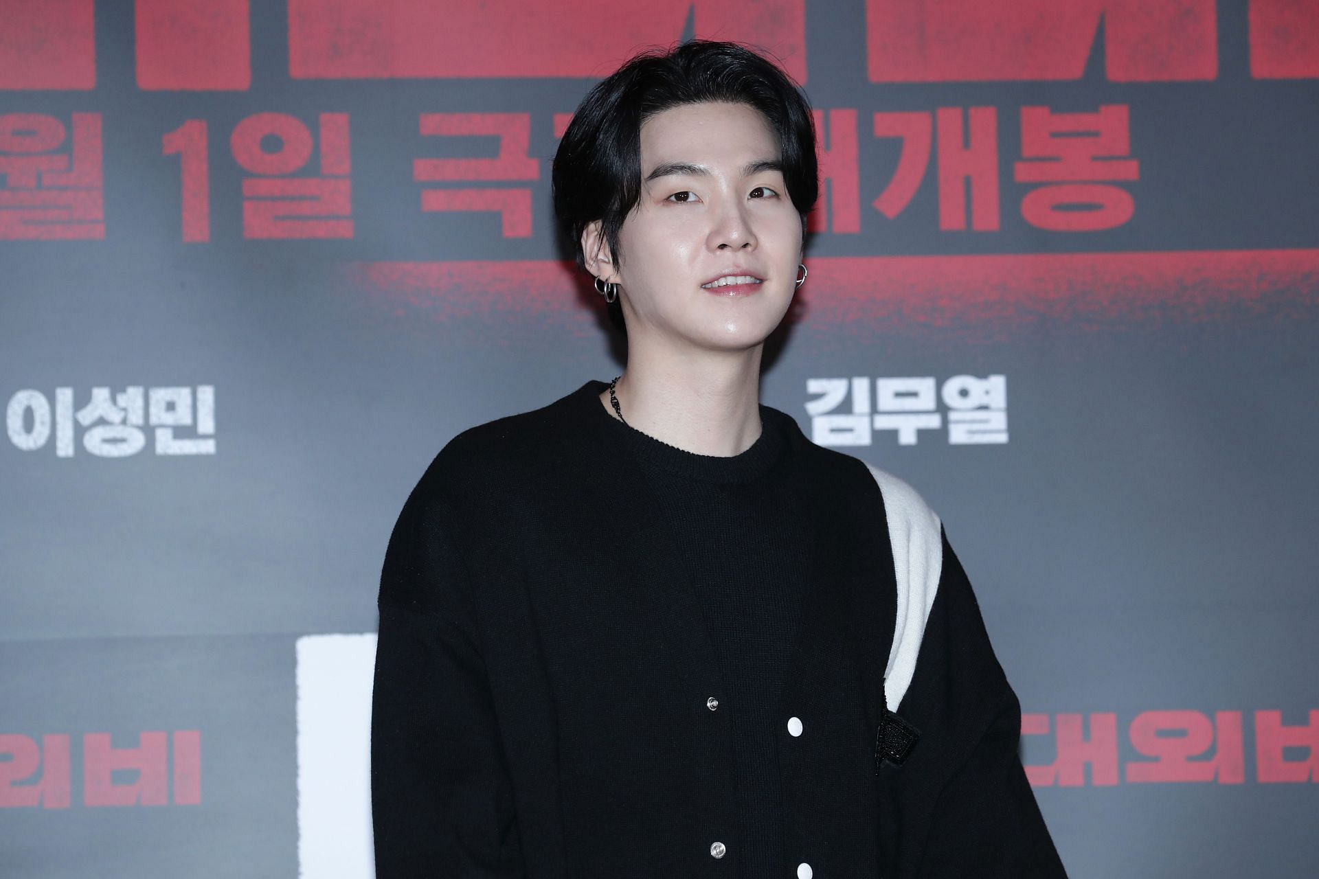 Suga attended the screening of 'The Devil's Deal' at COEX Megabox on February 27, 2023 in Seoul. (Image via Getty)